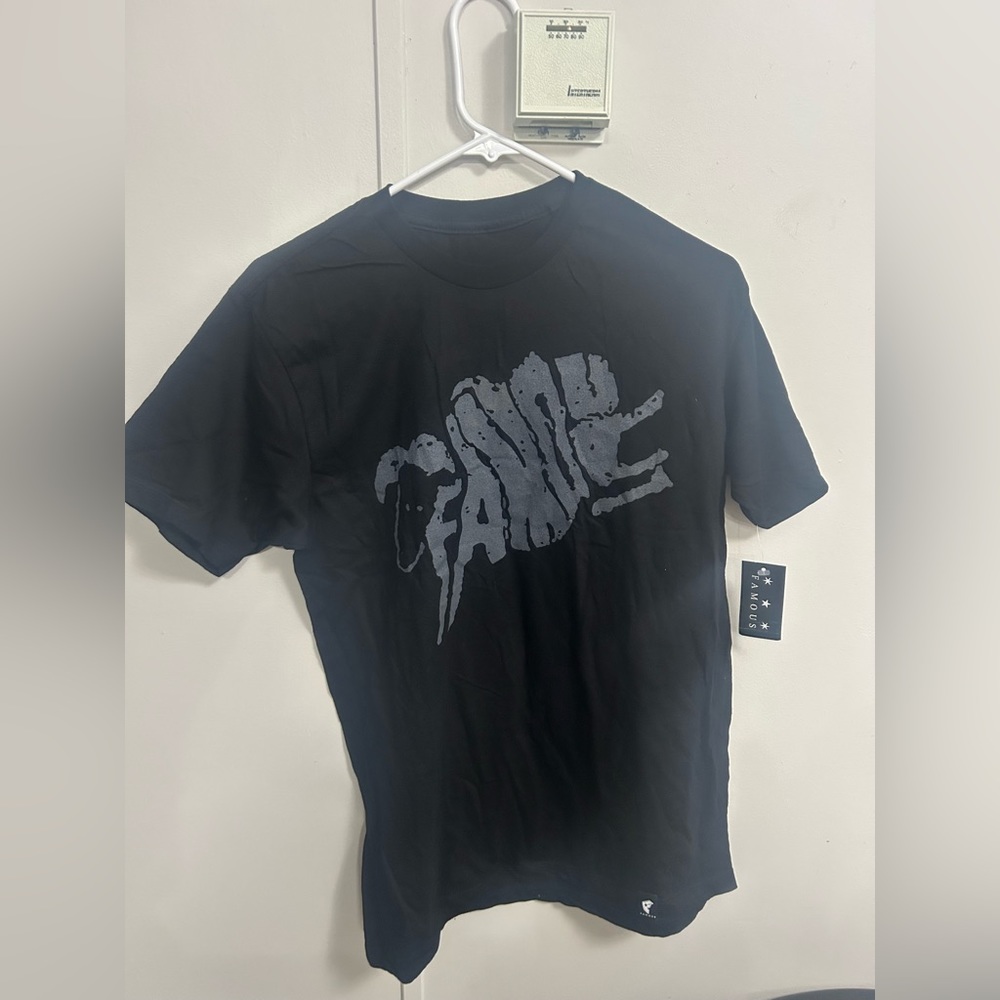 Famous black medium T shirt new